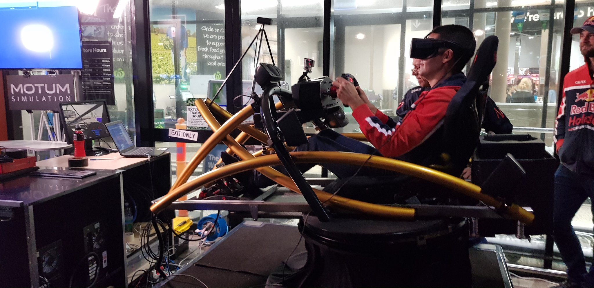 Red Bull Racing drivers try the Oculus Rift Motum Simulators ahead of